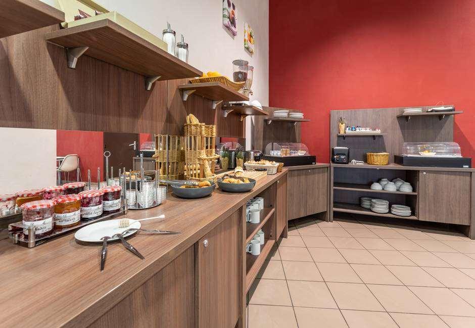 Comfort Aparthotel Nimes Centre المطعم الصورة